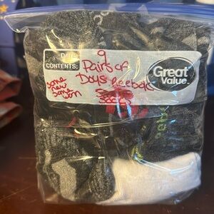 9 pairs of boys Reebok socks.